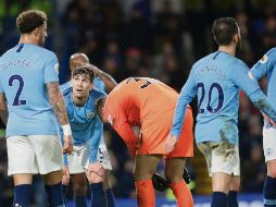 Jugadores del City se lamentan tras su primer revés de la temporada. AP