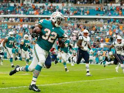 Kenyan Drake corrió 52 yardas para anotar el touchdown que significó el triunfo de Miami. AFP/M. Reaves