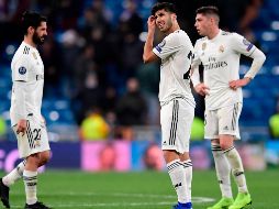 El equipo merengue recibirá en el partido de ida de octavos del torneo al que fuera su verdugo el pasado año en cuartos de final de esta competición. AFP / J. Soriano