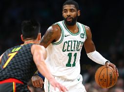 Kyrie Irving (#11) colaboró con 24 punto para el triunfo de los Celtics. AFP / M. Meyer