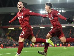 La entrada de Shaqiri (I) al minuto 70 terminó siendo decisiva. AFP/P. Ellis