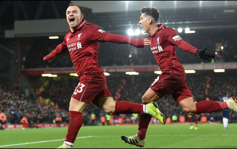 La entrada de Shaqiri (I) al minuto 70 terminó siendo decisiva. AFP/P. Ellis