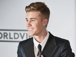 El cantante ha mostrado un comportamiento ejemplar que contrasta con su actitud previa al matrimonio. AFP