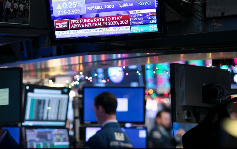 La sesión de hoy en Wall empezó bien y el Dow Jones llegó a subir 350 puntos, pero los anuncios de la Fed afectaron los indicadores. AP/M. Lennihan