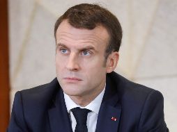 Macron afirma además que el Estado dará una respuesta fuerte a los autores de los disturbios y numerosos destrozos durante las manifestaciones. AFP / L. Marin
