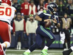 Russell Wilson completó 18 de 29 pases para 271 yardas. AFP/A. Parr