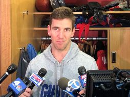 Eli Manning, quien está en su 15 temporada profesional, tiene un año más en su contrato. AP / T. Canavan