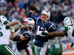 Brady completó 24 de 33 pases para 250 yardas y cuatro anotaciones, reponiéndose de su peor actuación desde 2006. AP/C. Krupa