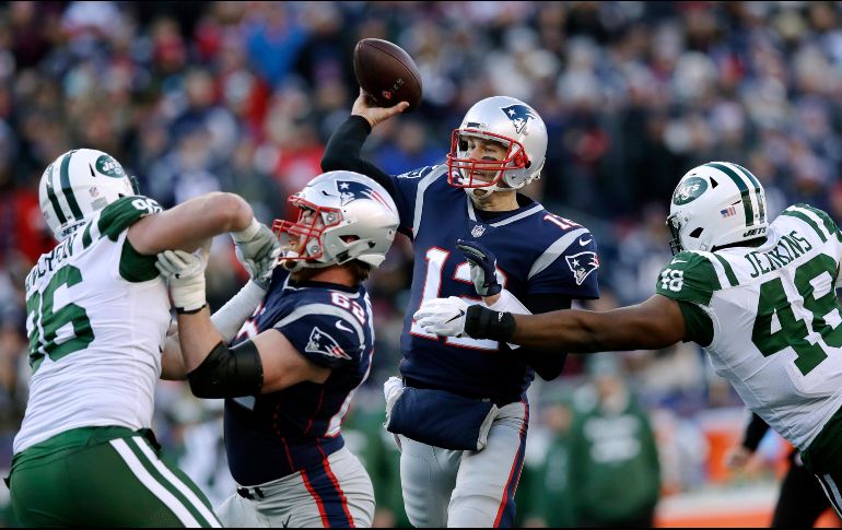 Brady completó 24 de 33 pases para 250 yardas y cuatro anotaciones, reponiéndose de su peor actuación desde 2006. AP/C. Krupa