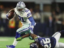 El corredor de los Cowboys terminó con 137 yardas y un touchdown en 26 acarreos en el juego de ayer ante los Seahawks. AFP