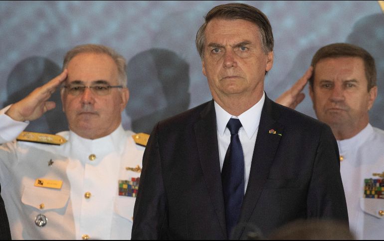 Bolsonaro aseguró que tanto Brasil como los migrantes estarán más seguros si el país adopta sus propias reglas. EFE/J. Alves