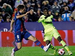 El tridente Coutinho-Dembélé-Malcom creó poco peligro. AP/A. Saiz