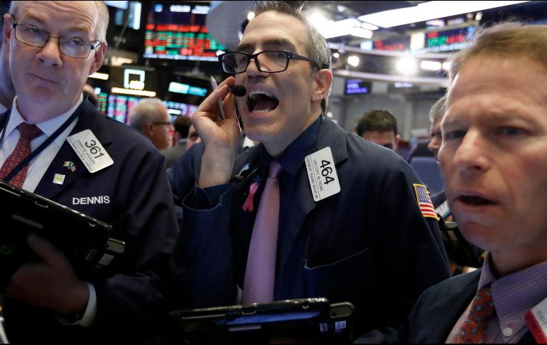 El índice compuesto Nasdaq avanzó un 0.71% o 49.77 puntos, hasta los 7,084.46. AP / ARCHIVO