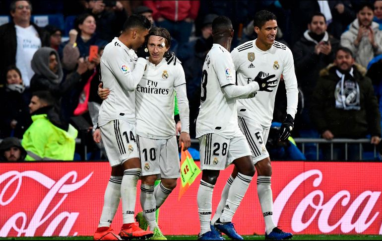 Con la victoria, los merengues llegan a 36 puntos y se sitúan a nueve unidades del Barcelona, lider del campeonato español. AFP/P. Marcoglu