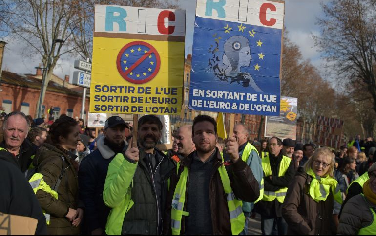 Las marchas se desarrollaron en medio de una amplia presencia policial y pese a las bajas temperaturas. AFP/L. Venance