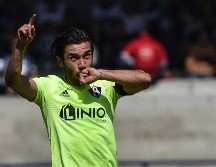 Vigón, capitán de los rojinegros, comandó la reacción de su equipo en el segundo tiempo. AFP / R. Arangua