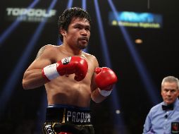 Autoridades realizan un inventario de la casa de Pacquiao y así determinar la cantidad de lo robado. AFP / ARCHIVO