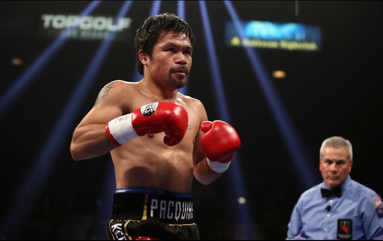 Autoridades realizan un inventario de la casa de Pacquiao y así determinar la cantidad de lo robado. AFP / ARCHIVO