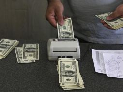 En la sesión, se espera que el tipo de cambio cotice entre 19.05 y 19.25 pesos por dólar. AP / ARCHIVO