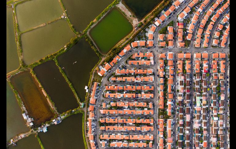 Campos de cultivos y una zona residencial. AFP/D. de la Rey