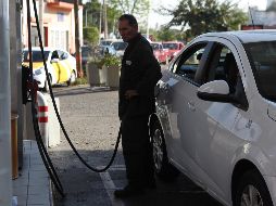 La gasolina Premium mantuvo un precio promedio sin ningún cambio de 20.60 pesos por litro, en tanto que la Magna tuvo una variación de 10 centavos, de 19.40 a 19.50 pesos. EL INFORMADOR/E. Barrera