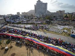 China se opone a la injerencia extranjera en los asuntos de Venezuela, en especial la amenaza de la intervención militar, y continuarán con su apoyo a los esfuerzos para mantener la soberanía nacional. AFP / R. Arboleda