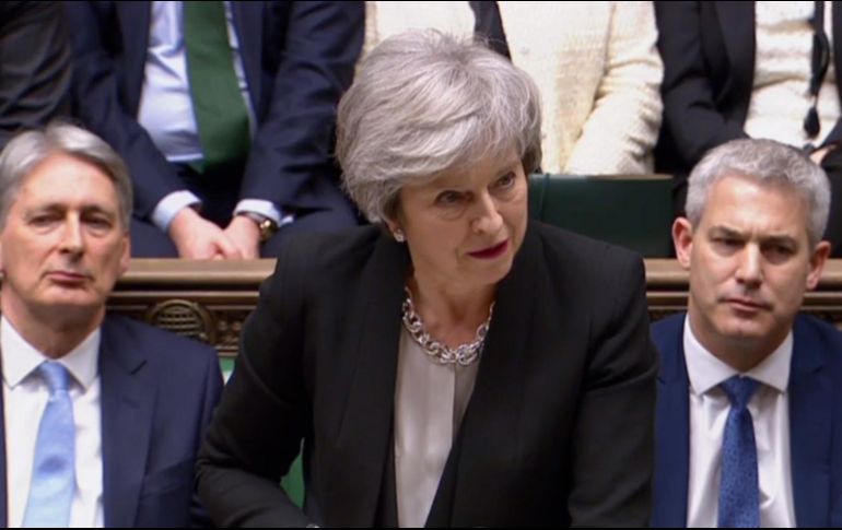 La primera ministra recordó, al término de la votación de las enmiendas, la contundente derrota que sufrió su acuerdo el pasado 15 de enero. AFP/ O. Scarff