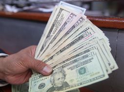 La moneda se compró en un precio mínimo de 18.00 pesos en bancos de la Ciudad de México. EL INFORMADOR/ARCHIVO