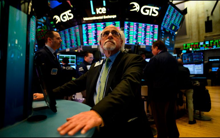 El entusiasmo en el mercado bursátil estadounidense se atemperó por un desalentador panorama de ingresos de Amazon. AFP/J. Eisele