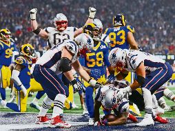 Sony Michel logró la única anotación de seis puntos del encuentro cuando pudo acarrear el ovoide por dos yardas a siete minutos del final del partido. AFP / M. Meyer