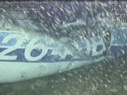 Toma del video que muestra la parte trasera izquierda del fuselaje, con parte del registro, de la aeronave hallada en el fondo del canal de la Mancha y en la cual viajaba Emiliano Sala. AFP/AAIB