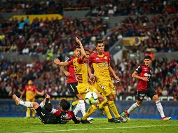 En el primer partido entre ellos en Copa, los Leones Negros vencieron 2-1 a los rojinegros. EL INFORMADOR / ARCHIVO