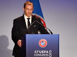 ''Estamos dispuestos a trabajar con la FIFA para que el futbol siga siendo el deporte número uno'', explica Ceferin. AFP / A. Solaro