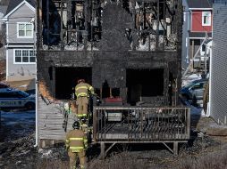 Las víctimas eran refugiados sirios, según la emisora pública CBC. ''Una mujer y un hombre permanecen en el hospital'', señala la policía, que investiga las causas del siniestro. AP / C. Calabrese