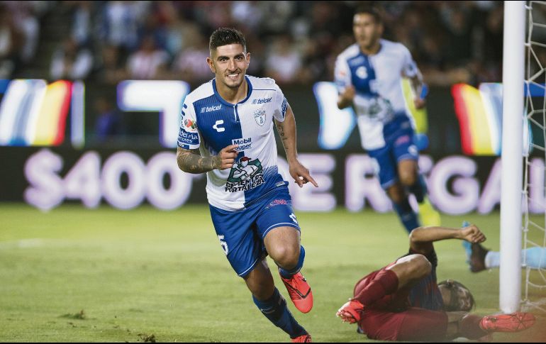 El ex rojiblanco Víctor Guzmán acaba de poner la pelota en las redes y se alista a un festejo sin remordimientos. MEXSPORT