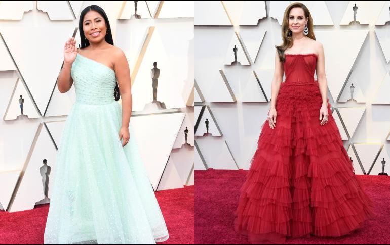 Yalitza luce un vestido color menta mientras que Marina de Tavira sorprende con un vestido color rojo. AFP /