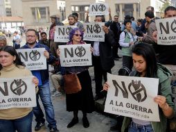 Decenas de venezolanos pidieron, en la cumbre del Grupo de Lima, detener las hostilidades. AFP/J. Barrero
