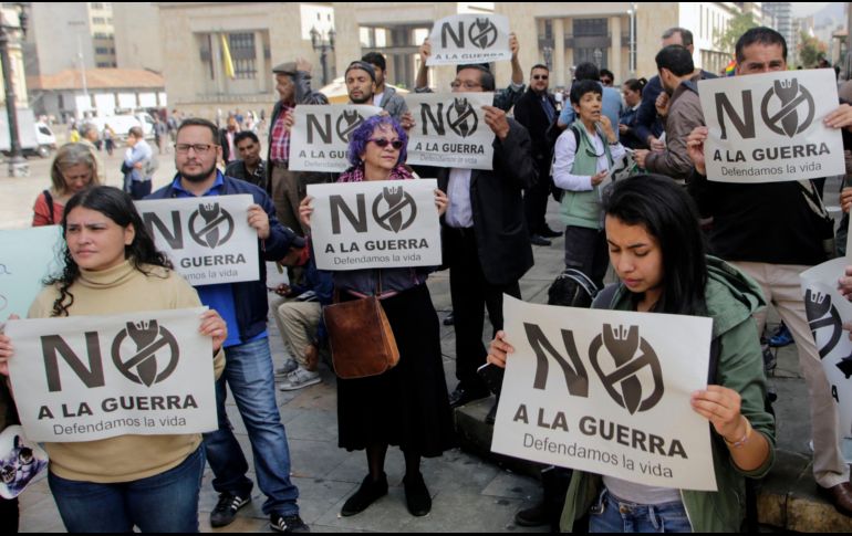 Decenas de venezolanos pidieron, en la cumbre del Grupo de Lima, detener las hostilidades. AFP/J. Barrero