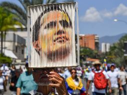 Guaidó, de 35 años, anunció el sábado pasado su retorno a Venezuela desde Ecuador y convocó a movilizaciones para este lunes y martes en Caracas y todas las ciudades del país. AFP / Y. Cortez