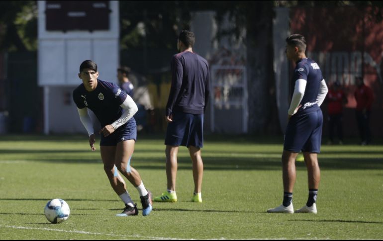 Algunos elementos como Alan Pulido, Isaac Brizuela, Miguel Ponce, entre otros, trabajaron diferenciados del grupo para darles descanso. EL INFORMADOR/ARCHIVO