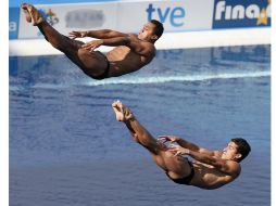 La pareja mexicana logró 413.61 puntos, y solo fue superada por los chinos Yuan Cao y Siyi Xie que ganaron 469.08 unidades. AP / ARCHIVO