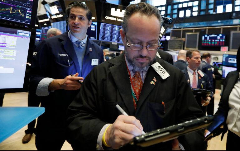 Los principales indicadores finalizaron en terreno negativo, tras una sesión influida por el anuncio del Banco Central Europeo. AP/R. Drew