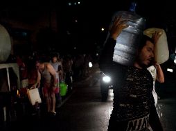 El gobierno de Maduro afirma que las fallas eléctricas se deben a un ataque cibernético perpetrado por EU y opositores locales. AFP / ARCHIVO
