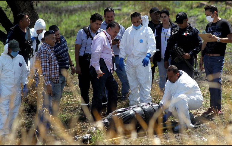 Hacia las 08:45 horas de este jueves se alertó de restos humanos dentro de bolsas al interior de un canal. AFP / U. Ruiz