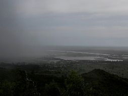 El fenómeno había dejado ya 126 fallecidos a su paso por Malaui, Mozambique y Sudáfrica, informó este sábado el ejecutivo de Harare. AFP / A. Gumulira