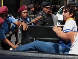 Las acciones de la Policía de Nicaragua incluyeron golpes a varias personas, así como agresiones a un fotoperiodista. AFP/M. Valenzuela