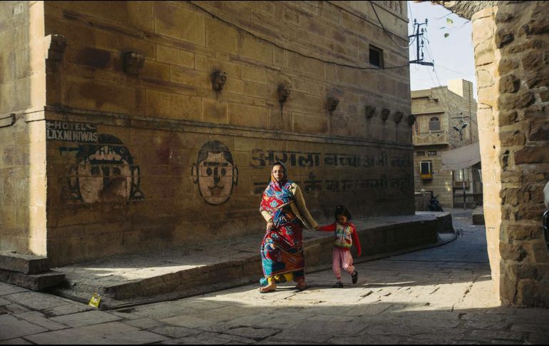 Control. En algunas ciudades se pinta propaganda pidiéndole a los habitantes evitar tener más de tres hijos. EL INFORMADOR / G. Gallo