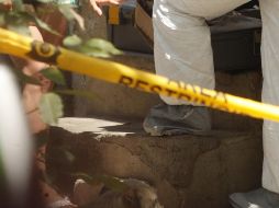 Al lugar se trasladaron elementos forenses y peritos de la Procuraduría de Justicia. EL INFORMADOR/ARCHIVO