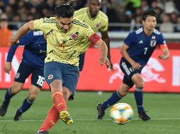 Radamel Falcao le dio la victoria a Colombia al anotar un penalti al minuto 64. AFP/K. Nogi