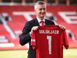 Manchester United recompensa a su también ex jugador por sus excelentes resultados desde que asumió las riendas del equipo, con 14 victorias en 19 partidos. AFP / O. Scarff